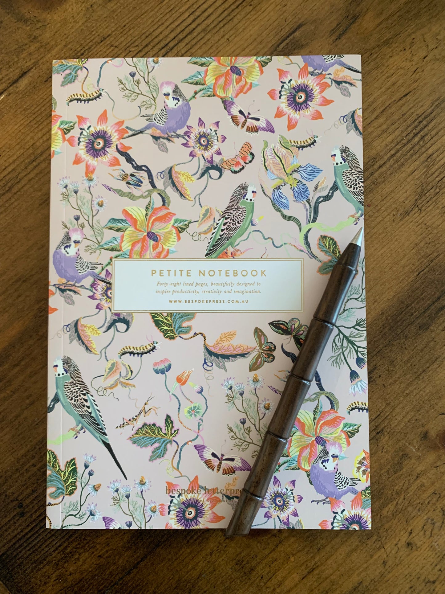 Petite notebook budgies green pink and purple floral background passionfruit flowers butterflies with pen